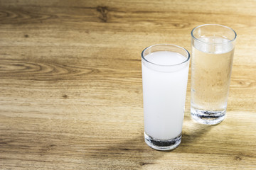Turkish raki on wooden table