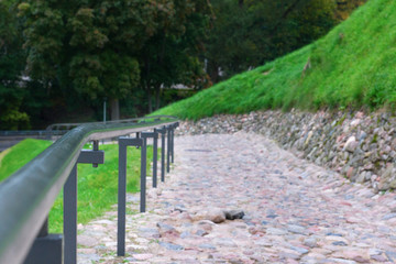 railings along the paved road