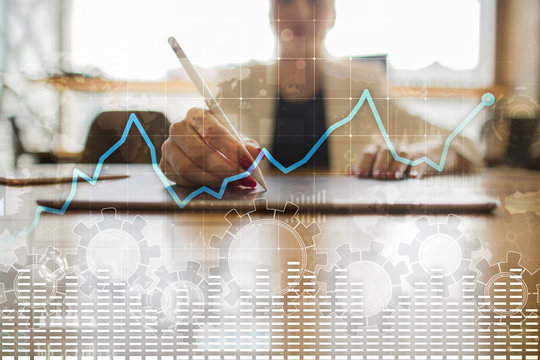 Data analysis graph on virtual screen. Business finance and technology concept.