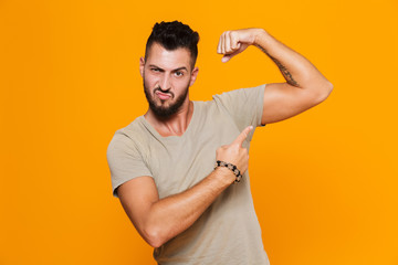 Portrait of a happy young casual man standing