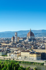 Panoramic view of Florence, Italy before sunset with the view of Arno river and the famous Cathedral Santa Maria del Fiore and the Duomo.