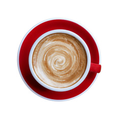 Top view of hot coffee cappuccino latte cup on red ceramic saucer with stirred spiral milk foam isolated on white background, clipping path included.