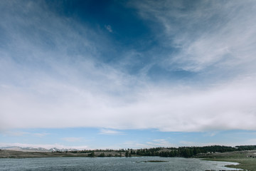 Blue sky background with clouds
