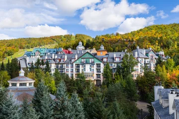 Fotobehang Mont-Tremblant village general view of condos and mountain in fall © ericlefrancais1
