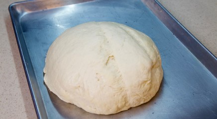 Fresh Raw Dough Ball In Baking Tray
