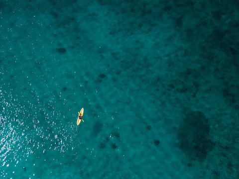 Sup surfing (kayaking) in Caribbean sea, Dominican Reublic