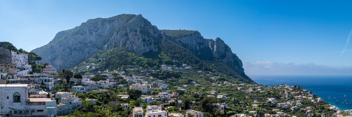 Fototapeta na wymiar Famous Capri Island panorama on a beautiful summer day in Italy