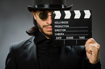 Vintage concept with man wearing black top hat