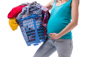 Woman holding basket of dirty clothing requiring washing