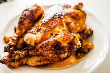 Roast chicken on white plate