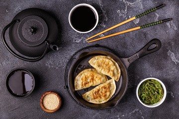 Gyoza or dumplings snack with soy sauce.