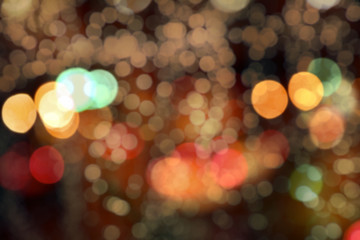 Blurry background image of defocused colorful lights at night
