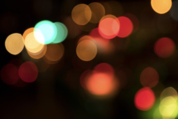 Blurry background image of defocused colorful lights at night
