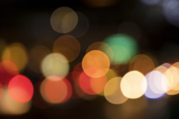 Blurry background image of defocused colorful lights at night