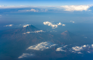 Mount Ararat volcano in Turkey (5137m altitude) and Little Ararat in the right. aerial view from airplane
