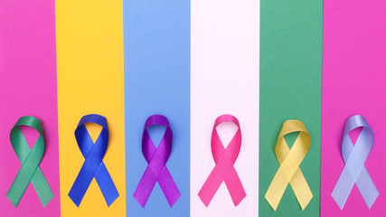 World cancer day background. Colorful ribbons, cancer awareness. multi-colored surface....