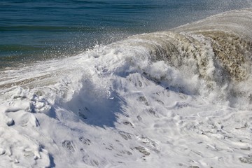 frothy foamy ocean wave close up