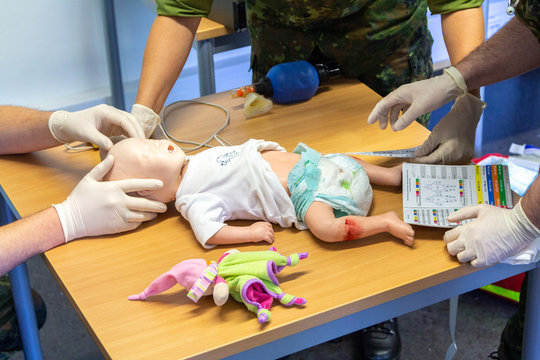 Medical exercise with equipment on a child puppet