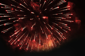 Fireworks. Salute. Sky background Fantastic flame of bright sparkling lights in the night sky...