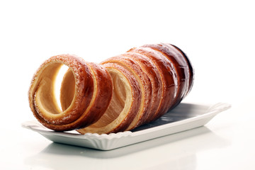 chimney cake. street food pastry with sugar for christmas.