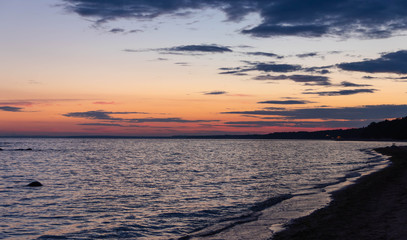 Obraz premium Autumn sunset over the Gulf of Finland in yellow-blue colors