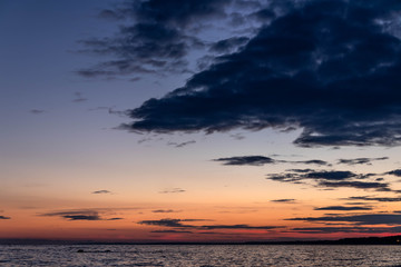Autumn sunset over the Gulf of Finland in yellow-blue colors
