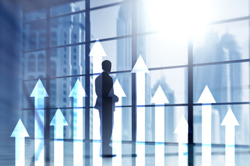 Up arrow graph on skyscraper background. Invesment and financial growth concept.