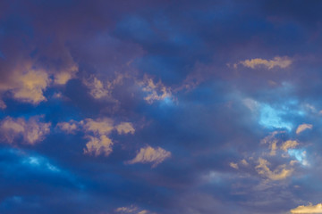 beautiful dark blue sky with clouds at sunset