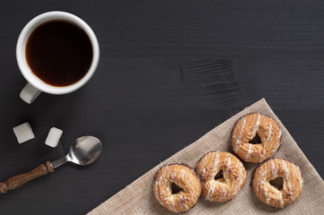 Shortbread cookies with chocolate and cup of coffee