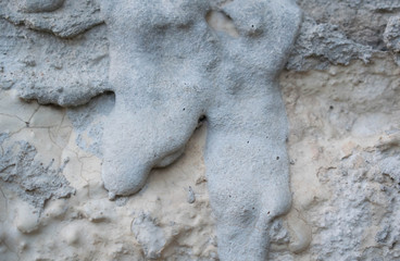 wall of concrete stony putty with irregularities for the design background