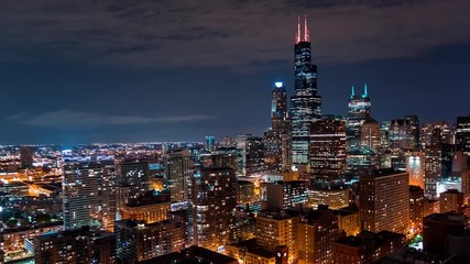 Time-lapse of the Chicago skyline at night with skycrapers - Powered by Adobe