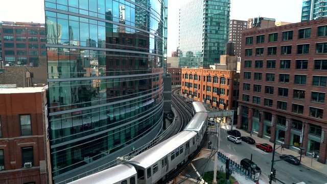 Trains curve through Downtown Chicago via the L CTA system