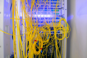 Batch wires are connected in the Optical Fiber Distribution Frame. Messy cables are intertwined in...