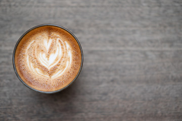 Cortado coffee on grey table top