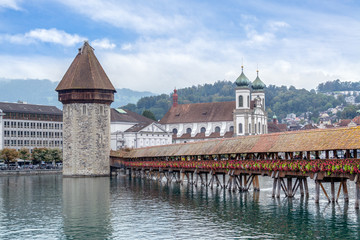 The panoramic view of the famous Chapel Bridge or Kapellbrücke (in German) in Luzern, Switzerland.
