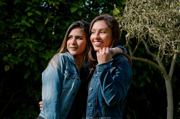 Outdoor lifestyle portrait of two best friends