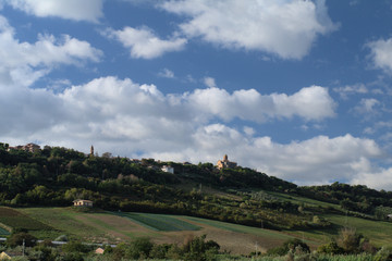 Fototapeta na wymiar landscape with church,hill,horizon,clouds,sky,blue,countryside,panorama,village