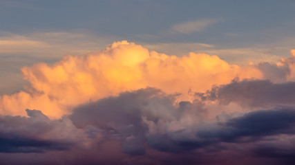 red-orange dramatic sunset with thunderstorm clouds 16:9