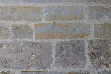 Old grey brick wall.