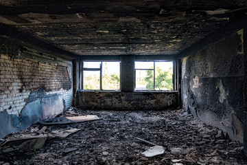 Burned interiors after fire in industrial or office building