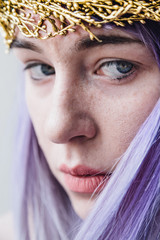 Woman With Purple Hair and Blue Eyes