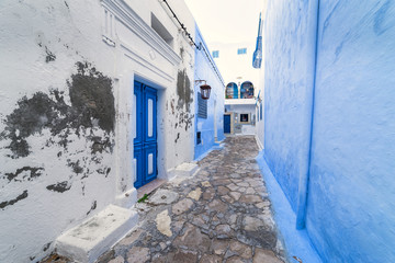 Hammamet Medina streets with blue walls, decor and elements. Tunis, north Africa.