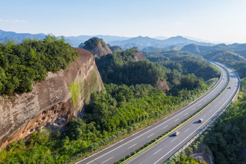 highway in mountainous area with danxia landform