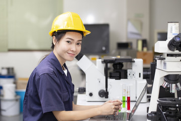 woman asian engineer doing chemical test in laboratory, science and research concept