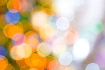Obraz premium Colourful & Beautiful Blurry circle bokeh, out of focus background in the Christmas concept and theme.