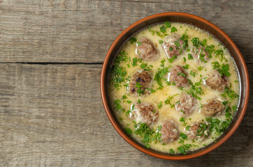 Meatballs with rice in lemon-egg sauce. Traditional Greek cuisine. The view from the top. Copy-space.