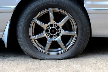 Car Flat tire on the road, car accident for insurance