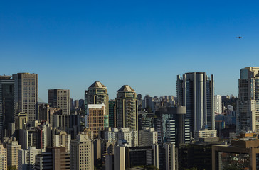 Fototapeta na wymiar View at modern courtyard. Facade of modern building. Sao Paulo city, Brazil. South America. 