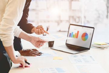 UI UX designer sketching layout design  application on mockup mobile phone.