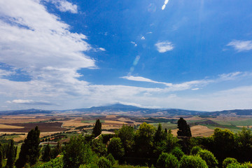 Fototapeta na wymiar Tuscan fields and hills viewed from Pienza, Italy